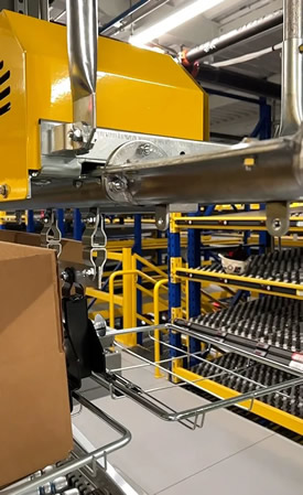 overhead-conveyors-in-pick-modules-for-order-fulfillment-operations overhead monorails in pick modules for empty carton induction
